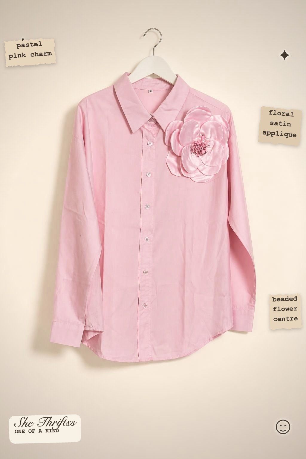 Pink shirt with floral detail