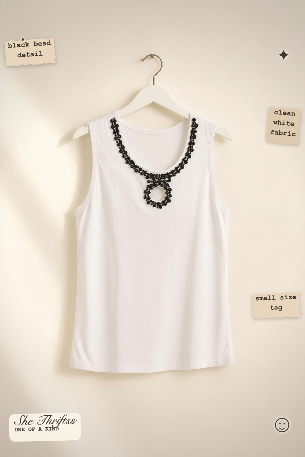 White beaded sleeveless top